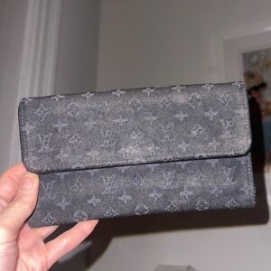LOUIS VUITTON Porte Tresor International Monogram Mini Lin Wallet
